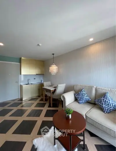 Modern living room with stylish decor and open kitchen layout