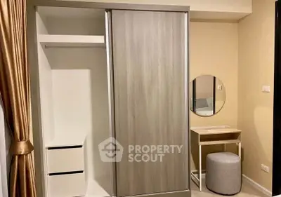 Modern bedroom with sliding wardrobe and stylish vanity set