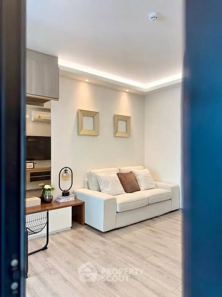 Modern living room with cozy sofa and stylish decor