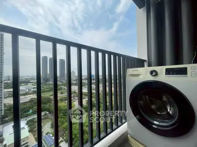 High-rise balcony with city view and washing machine, perfect for urban living.