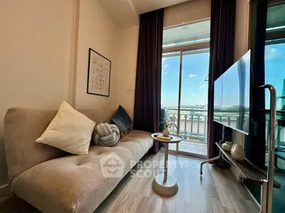 Cozy living room with modern decor and balcony view