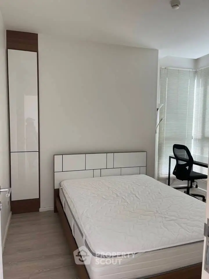 Modern bedroom with minimalist design and natural light