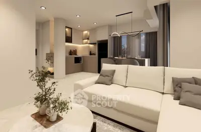 Modern open-plan living room with elegant kitchen and cozy seating area