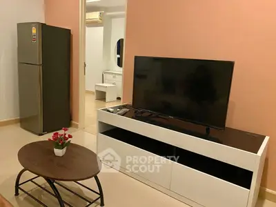 Modern living room with sleek TV stand and stylish coffee table