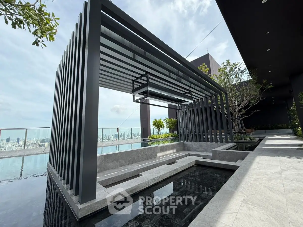 Luxurious rooftop with modern pergola and stunning city view, perfect for relaxation and entertainment.