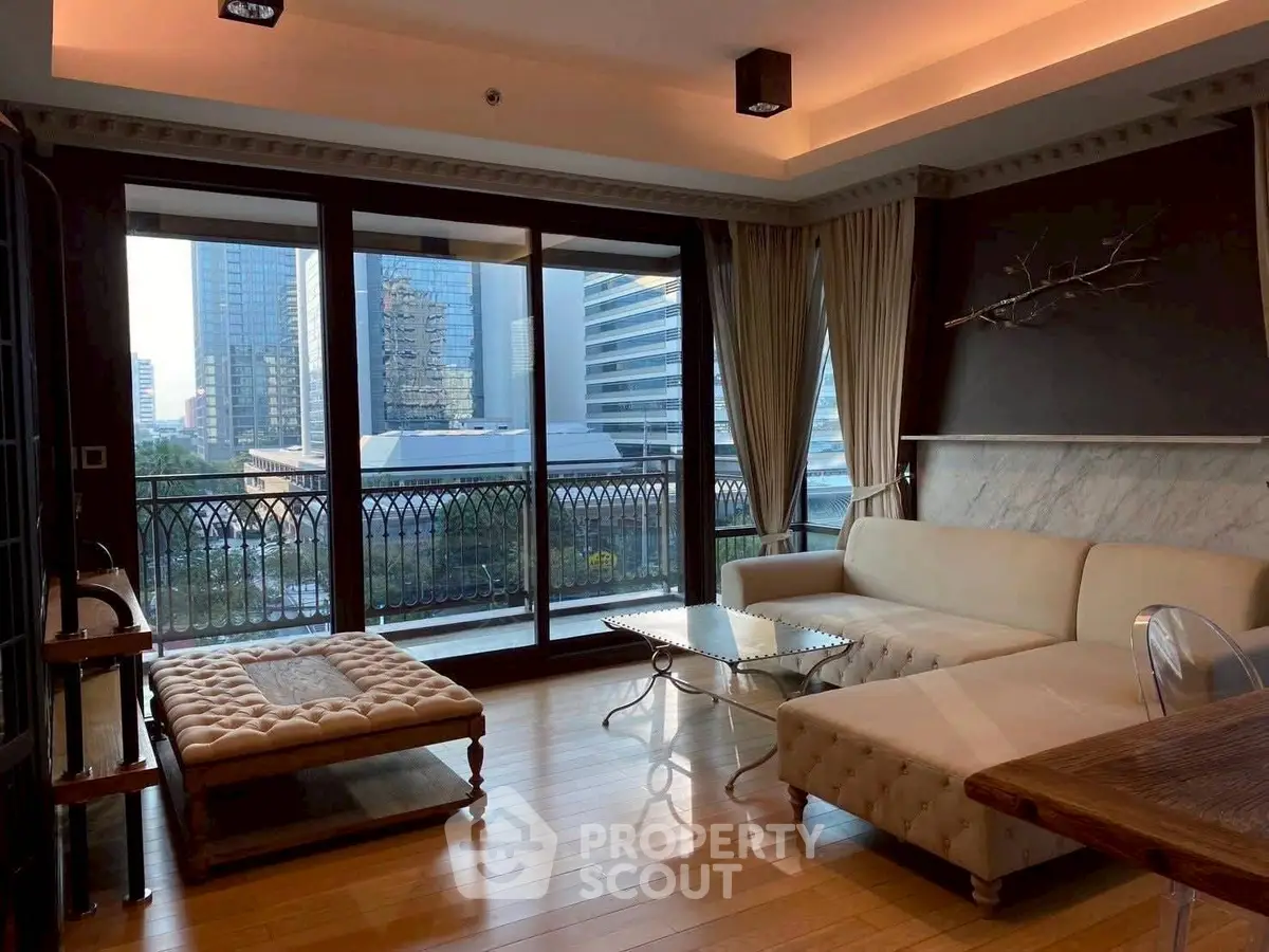Luxurious living room with city view and elegant furnishings
