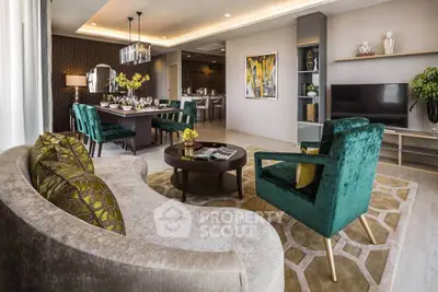 Luxurious living room with elegant decor and plush seating in a modern apartment.