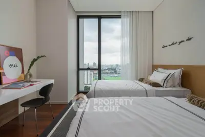 Modern bedroom with twin beds and city view, featuring sleek decor and large window for natural light.