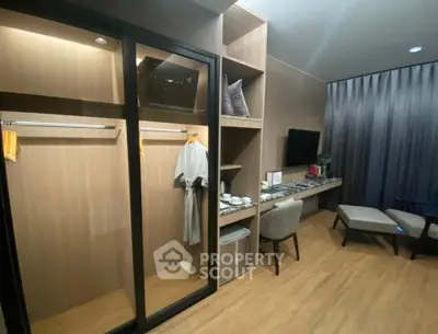 Modern bedroom with spacious walk-in closet and elegant decor