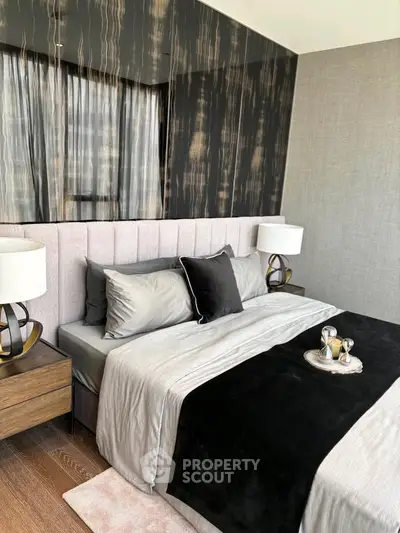 Luxurious modern bedroom with elegant decor and stylish furnishings, perfect for a serene retreat.
