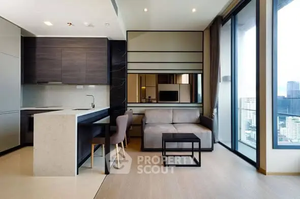 Modern living room with open kitchen and stunning city view from large windows.