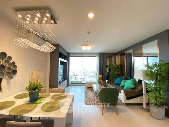 Spacious modern living room with elegant decor and large windows offering natural light.