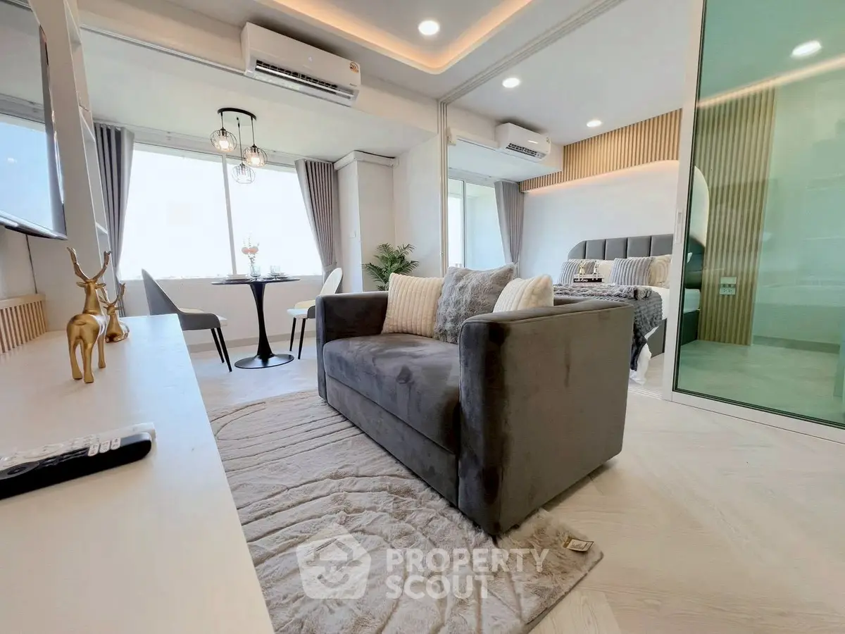 Modern living room with stylish decor and open layout in a luxury apartment.