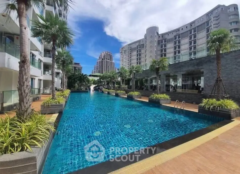 Luxurious condominium with stunning pool and modern architecture