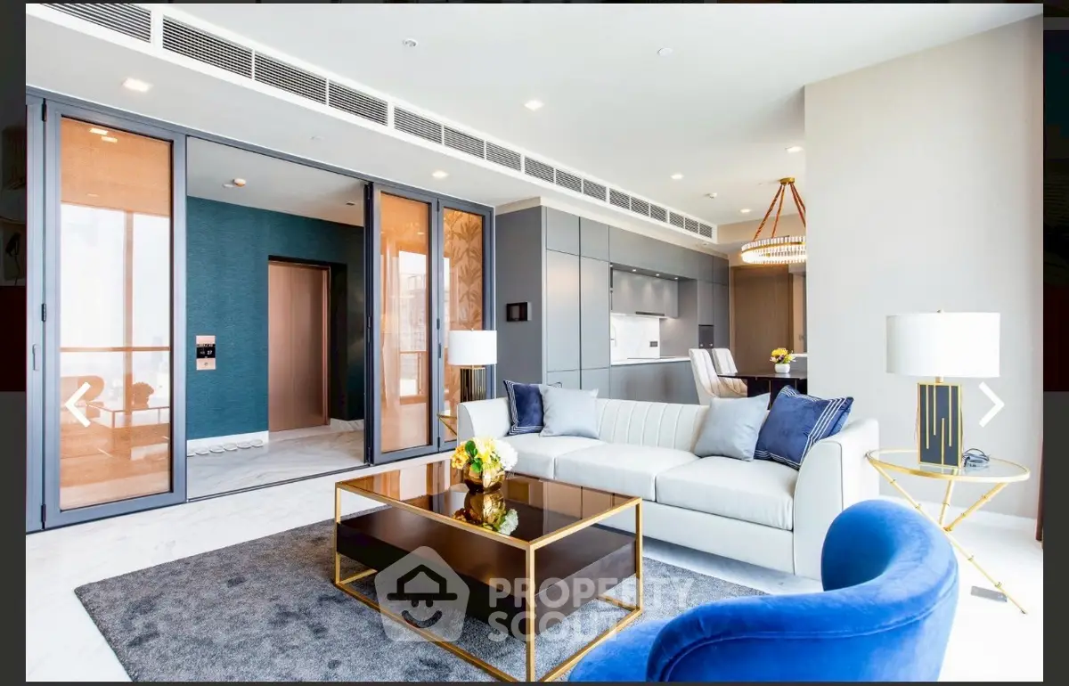 Luxurious modern living room with elegant decor and open kitchen layout
