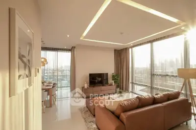 Luxurious living room with panoramic city views and elegant decor
