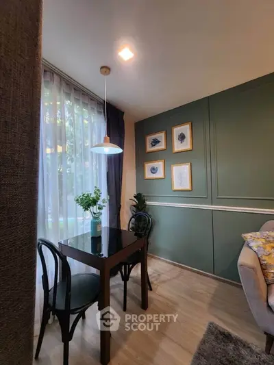 Charming living room with elegant decor and natural light, perfect for cozy gatherings.
