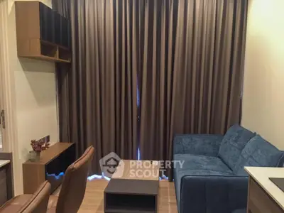 Cozy living room with modern furniture and elegant curtains