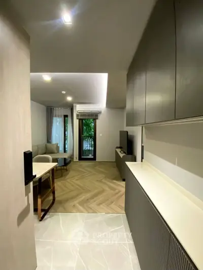 Modern living room with sleek design and balcony access