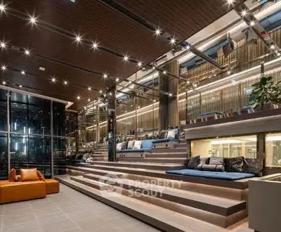 Luxurious modern living space with tiered seating and ambient lighting