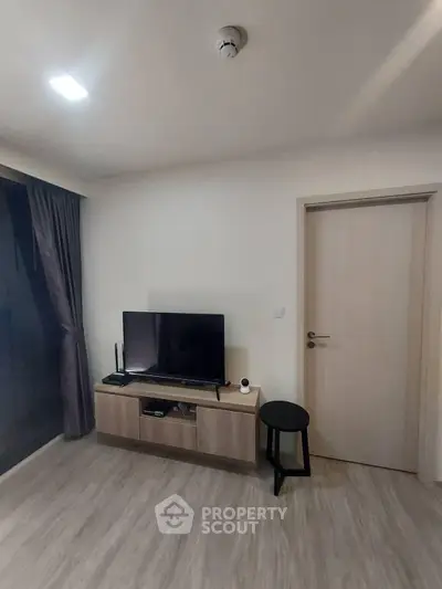 Modern living room with sleek TV setup and minimalist decor