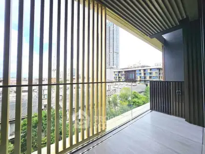 Spacious balcony with city view and modern architectural design.