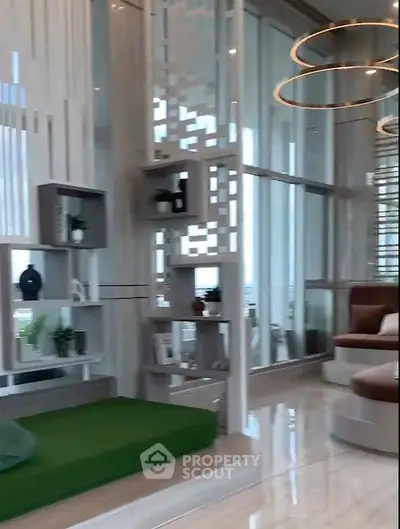 Luxurious modern living room with floor-to-ceiling windows and stylish decor