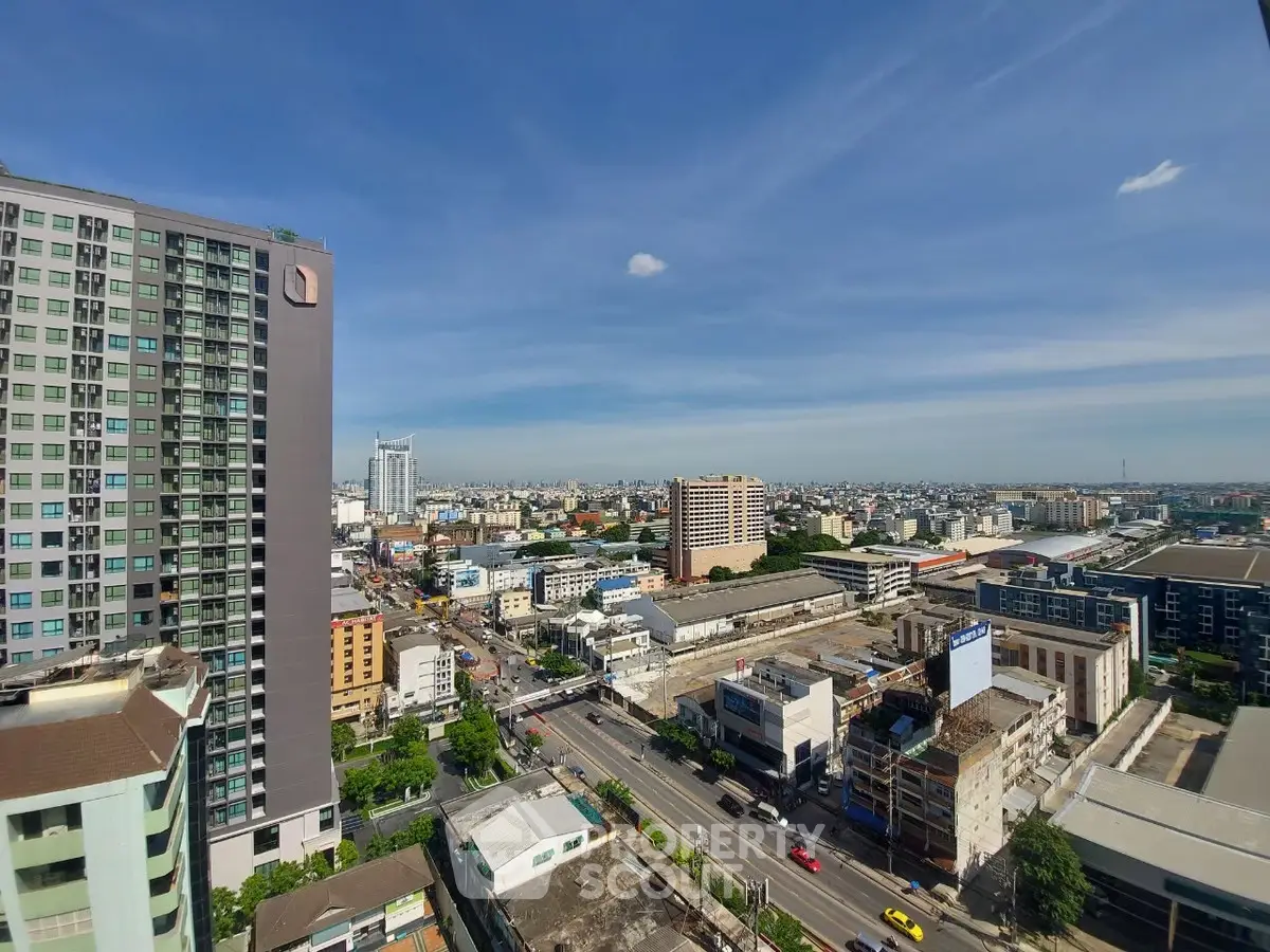 Stunning cityscape view from high-rise apartment balcony