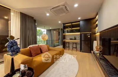 Luxurious modern living room with open kitchen and stylish decor