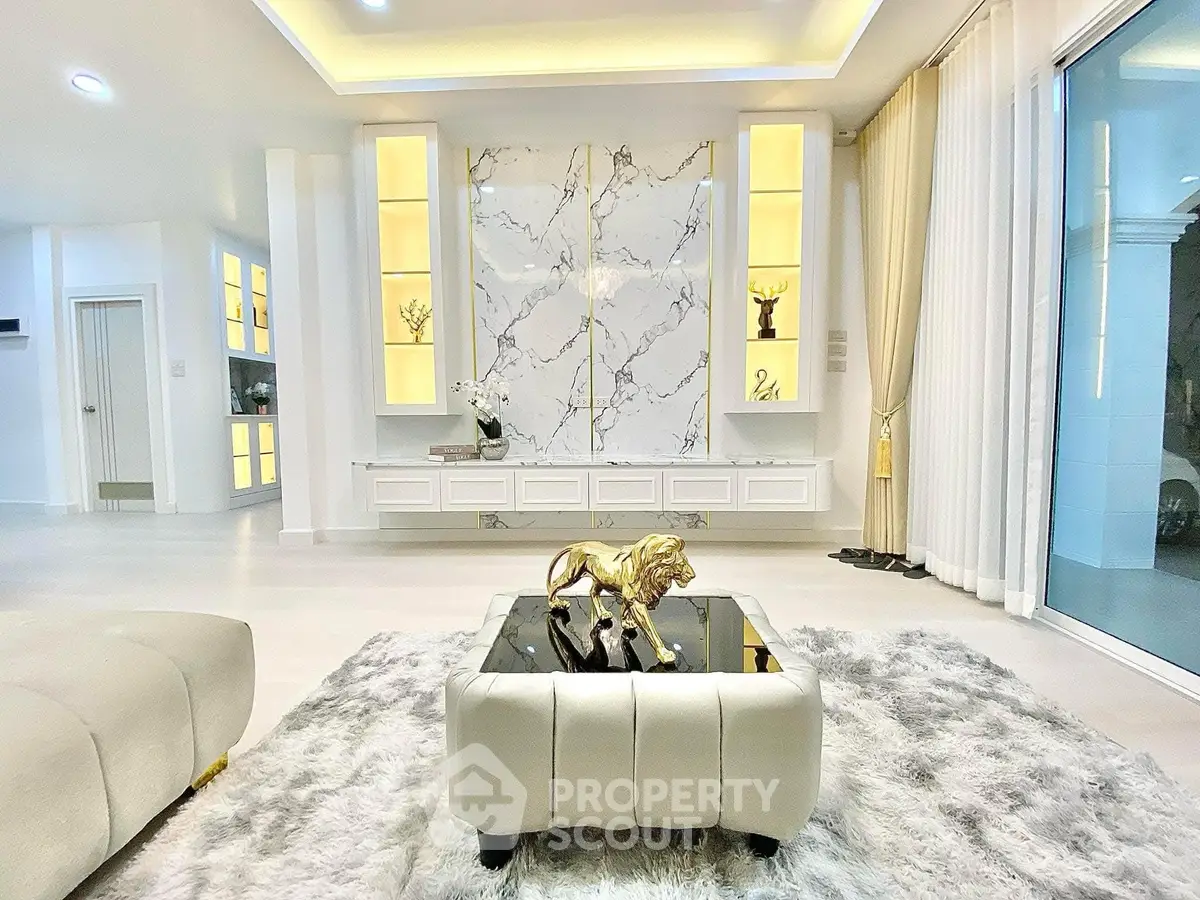 Luxurious living room with elegant decor and marble accents