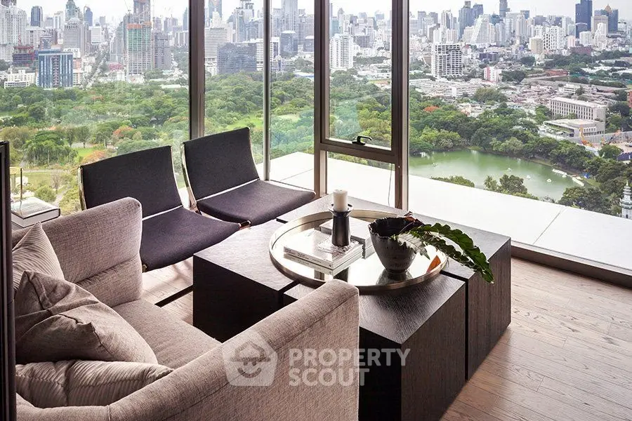 Luxurious living room with panoramic city view and modern furnishings.