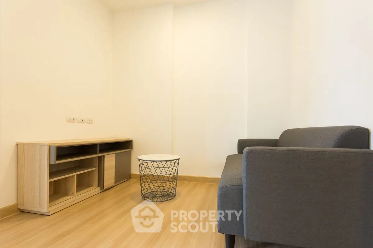 Cozy minimalist living room with modern sofa and wooden flooring