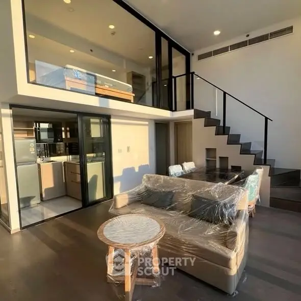 Modern duplex apartment with stylish interior and mezzanine bedroom