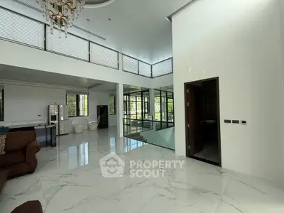 Luxurious modern living room with high ceilings and elegant marble flooring