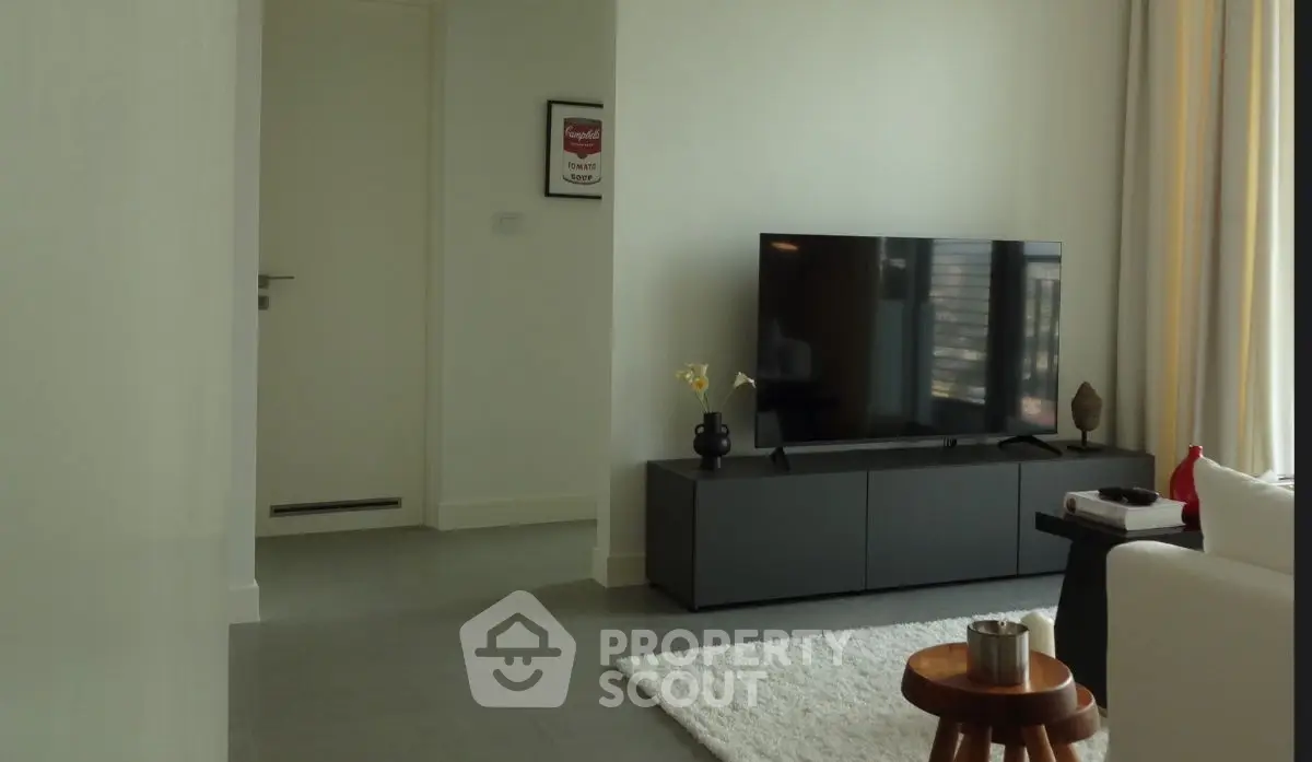 Modern living room with sleek TV setup and minimalist decor