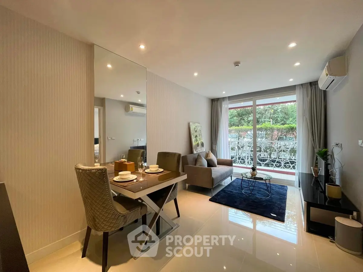 Modern living room with elegant dining area and garden view, featuring stylish decor and ample natural light.