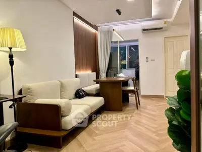 Modern living room with stylish furniture and elegant lighting