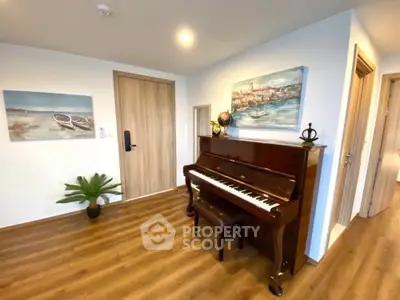 Charming interior with elegant piano and art in cozy living space
