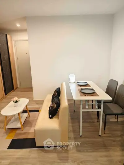 Modern living room with stylish dining area and cozy seating arrangement