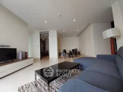 Spacious modern living room with sleek furniture and open layout