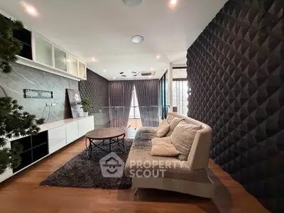 Stylish modern living room with textured walls and cozy seating area