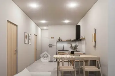 Modern minimalist kitchen with dining area and sleek appliances