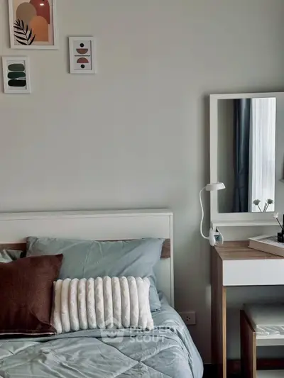 Cozy bedroom with modern decor and stylish furniture, perfect for relaxation and comfort.