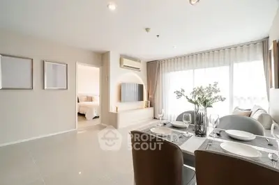 Spacious modern living room with dining area and natural light