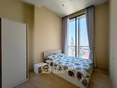 Modern bedroom with large window and city view, featuring minimalist decor and natural light.