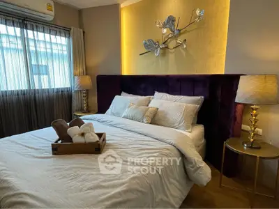 Luxurious bedroom with elegant decor and ambient lighting
