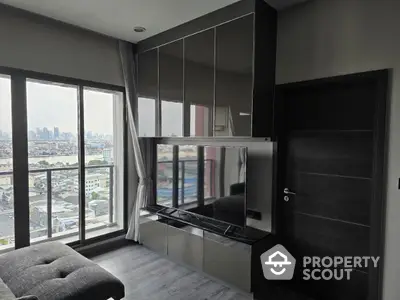 Modern living room with city view and sleek entertainment unit