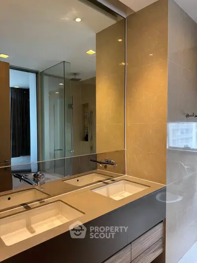Luxurious modern bathroom with dual sinks and elegant design