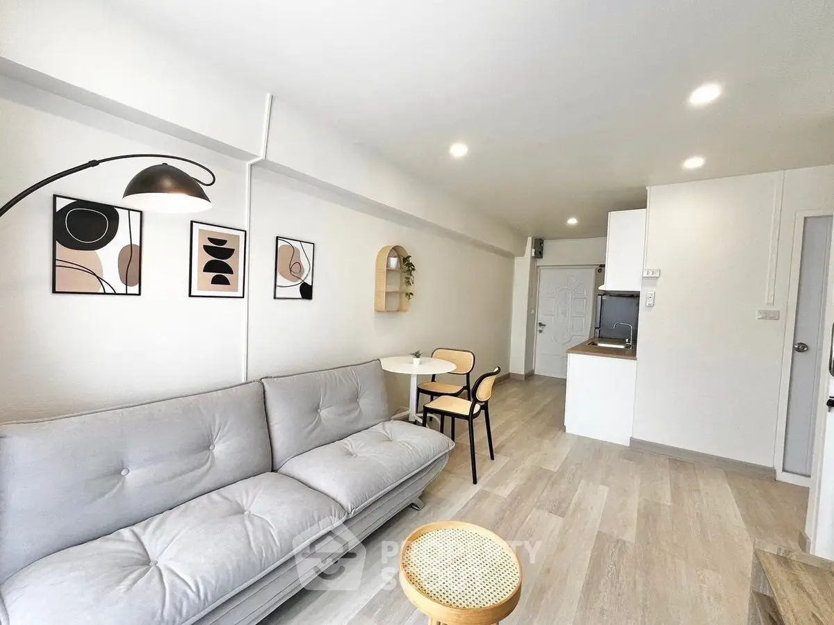 Modern living room with stylish decor and cozy seating area