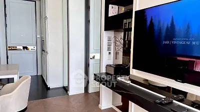 Modern living room with sleek TV setup and elegant decor